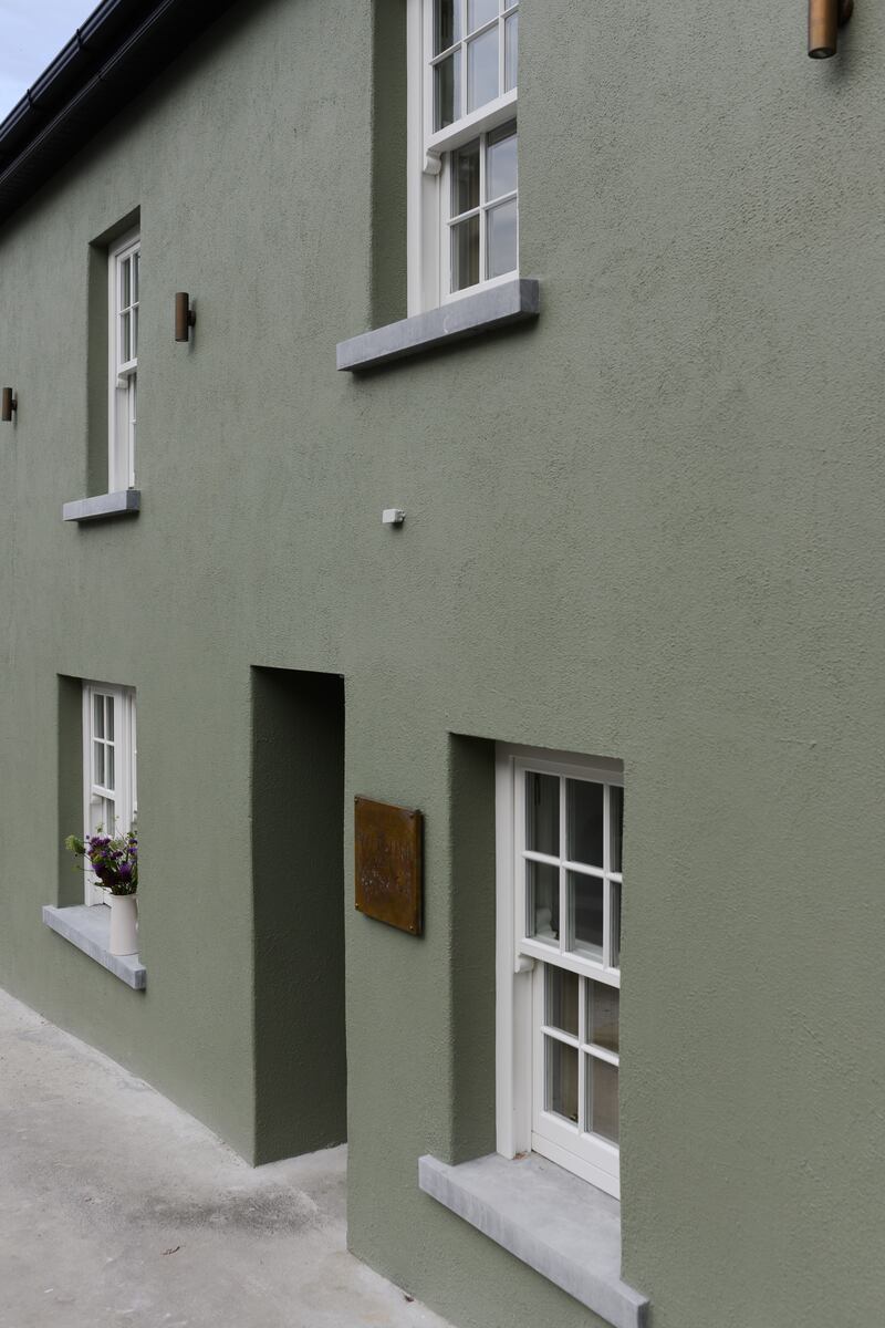 Two of the townhouses open directly from the street