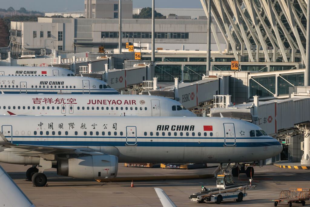 Aircraft stand on the Pudong International Airport, in Shanghai, China, The reopening of China's borders will help global air travel to return to pre-Covid levels. Photograph: Alex Plavevski/Shutterstock/EPA