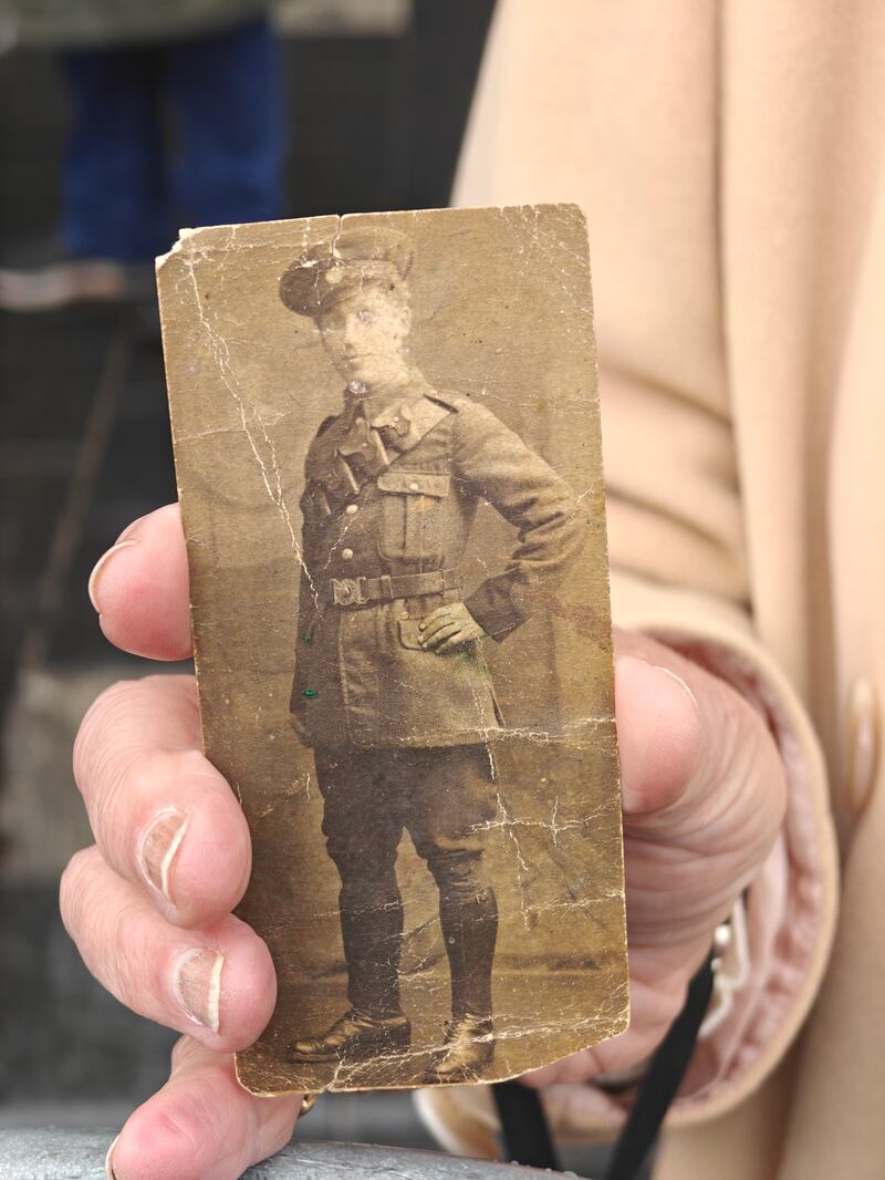 Ettie Fullam holding a photograph of her father, Patrick Roe, who participated in the 1916 Easter Rising. Photograph: Órla Ryan