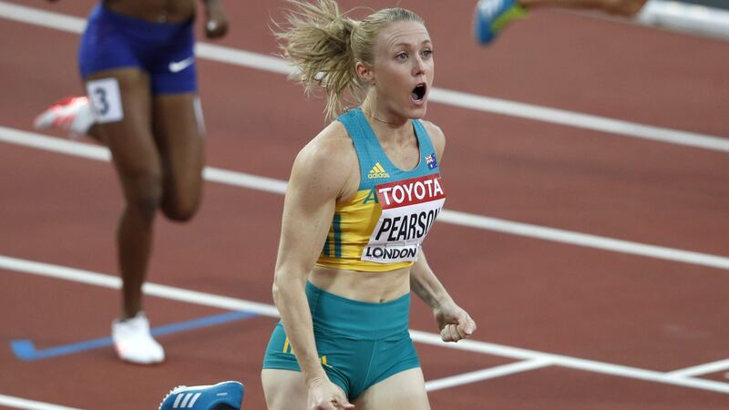 Australia’s Sally Pearson celebrates winning the final of the women’s 100m hurdles. Photo: Adrian Dennis/Getty Images