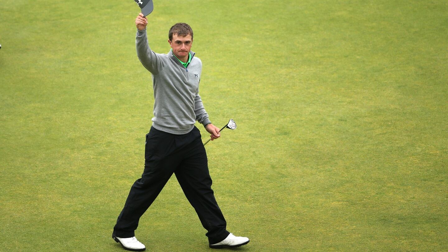 Paul Dunne salutes the crowd on the final hole at the British Open at St Andrews. Photo: Getty Images