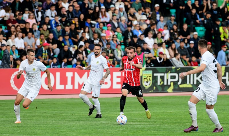 Derry’s Paul McMullan runs at the Tobol defence during the Uefa Europa Conference League third qualifying round, first leg at the Central Stadium in Kostanay, Kazakhstan. Photograph: Valeriy Kaliyev/Inpho