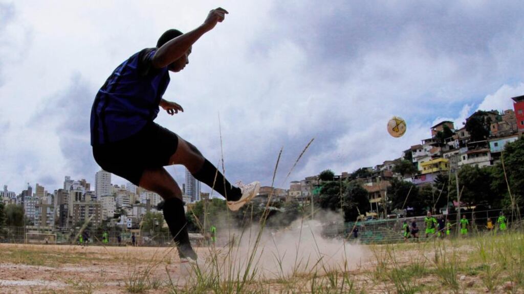 Sunday soccer is a decades-old tradition where Brazilians of all walks of life play matches that are known as “peladas” or “naked” on the beaches, in the slums, and on the streets. Photograph: Reuters/Washington Alves