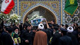 Mourners gather in muted memorial for Iran’s president Ebrahim Raisi