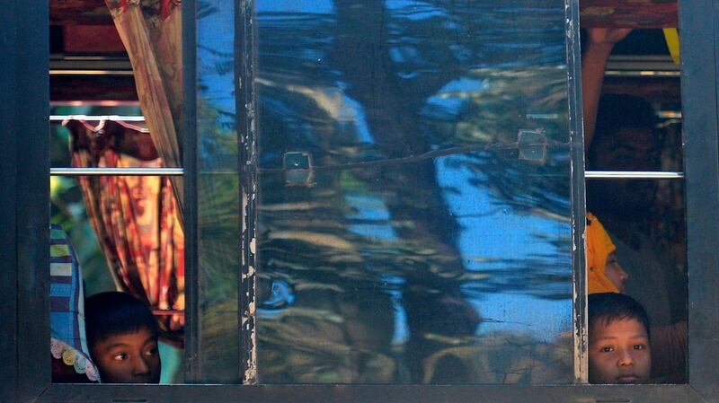 Rohingya refugees are transported to Chittagong district from a refugee camp for the first mass relocation of refugees to an island, in Ukhia Thursday. Photograph: Munir Uz Zaman/AFP