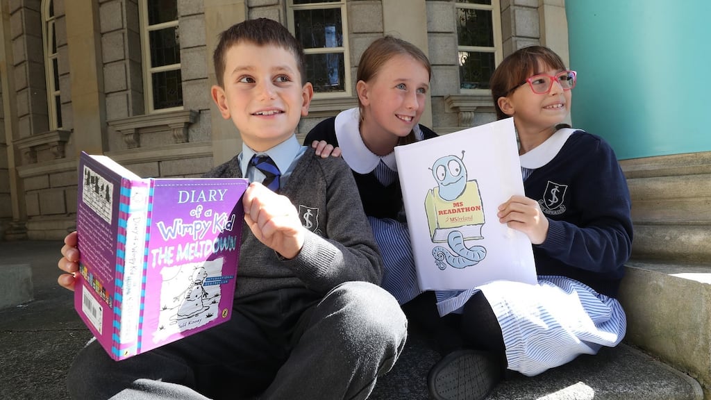 Axel Boissier, Emma Buzulan and Sive O’ Rourke – pupils from the John Scottus School, Co Dublin – at the National Library of Ireland at the launch of the MS Readathon. The MS (Multiple Sclerosis) Readathon 2019 will take place from October 11th to November 11th. Children, young people, teachers, schools and parents are asked to visit msreadathon.ie to register. Photograph: Robbie Reynolds