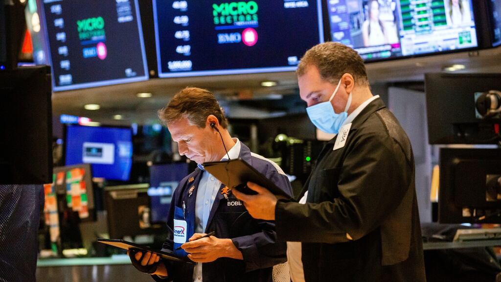 Traders work on the floor of the New York Stock Exchange. Photograph: Michael Nagle/Bloomberg
