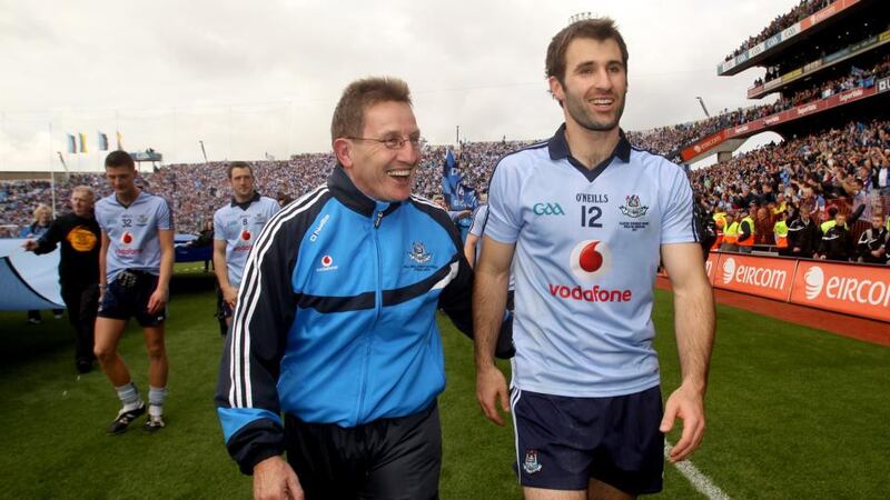 Niall Moyna with Dublin football captain Bryan Cullen after the All-Ireland victory over Kerry in 2011. Photograph: James Crombie/Inpho