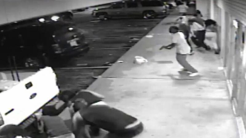 A Handout surveillance camera image released by Missouri police allegedly showing shooting suspect Tyrone Harris with a pistol in his hand during an exchange of gunfire with another individual or individuals in Ferguson. Photograph: St Louis County PD/EPA