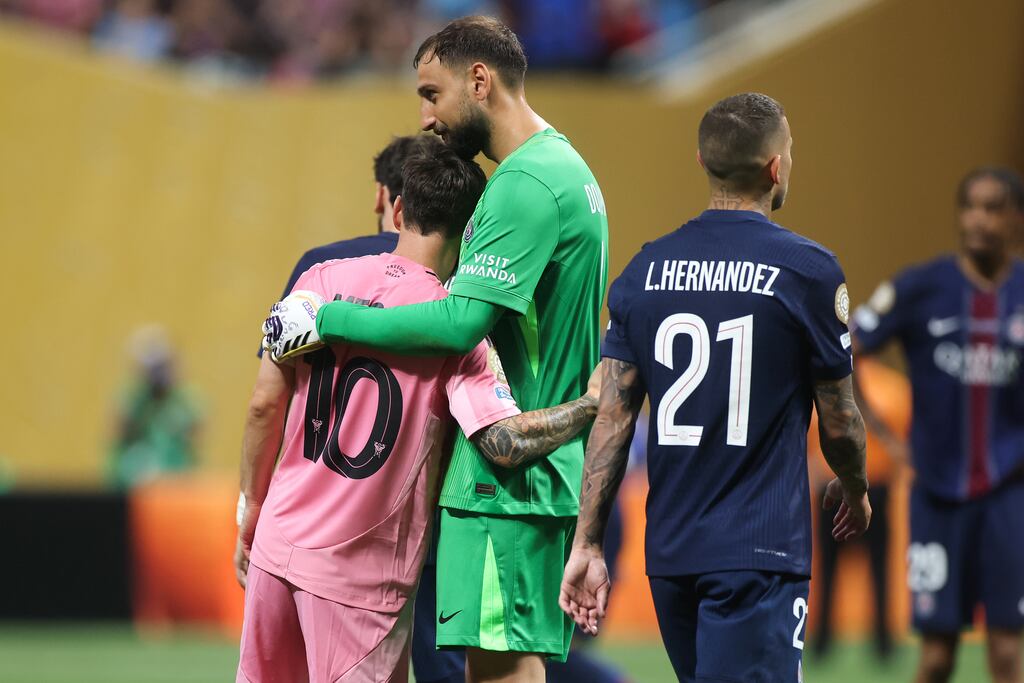 Lionel Messi of Inter Miami CF embraces Gianluigi Donnarumma of Paris Saint-Germain. Photograph: Alex Grimm/Getty