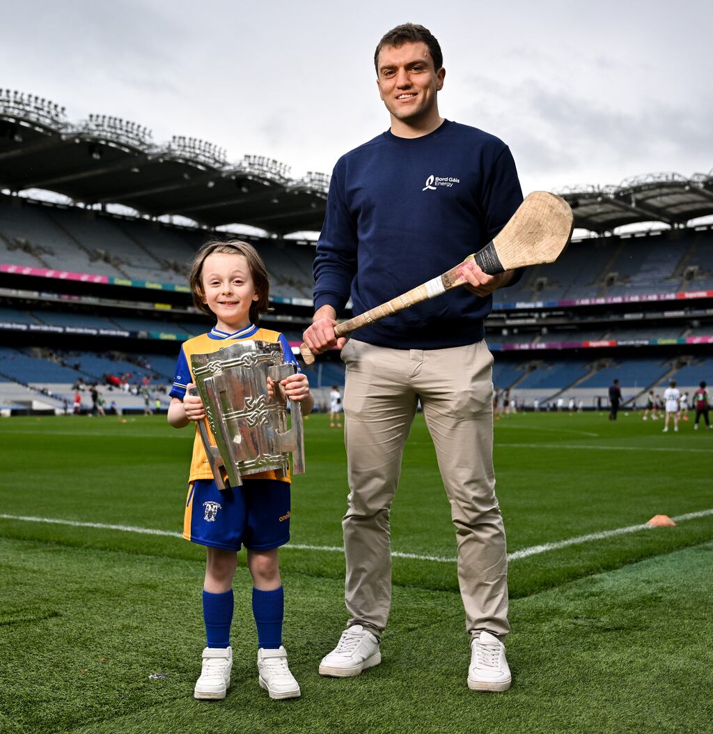 Hurling star Shane O’Donnell of Clare with Logan Clifford Hegarty, aged 6, at Croke Park in Dublin. Photograph: David Fitzgerald/Sportsfile