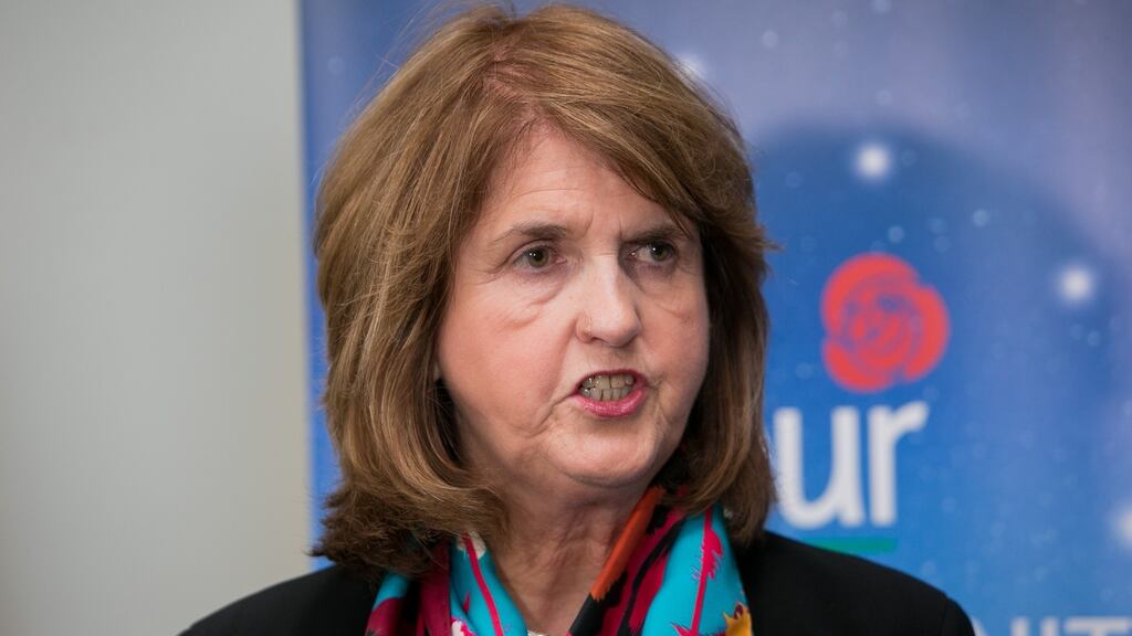 Tánaiste Joan Burton said the description of paramilitary activity in Northern Ireland contained in the report is ‘deeply shocking’.
