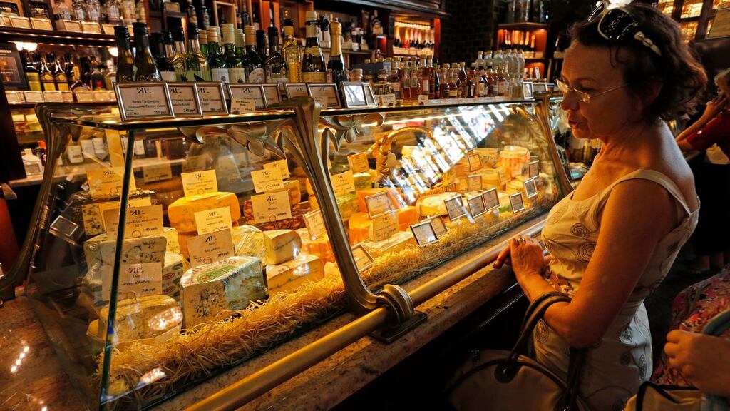 A woman in a supermarket in St Petersburg, Russia. Russian prime minister Dmitry Medvedev has signed a decree to ban food imports from Ukraine from January 1st. Photograph: EPA/Anatoly Maltsev