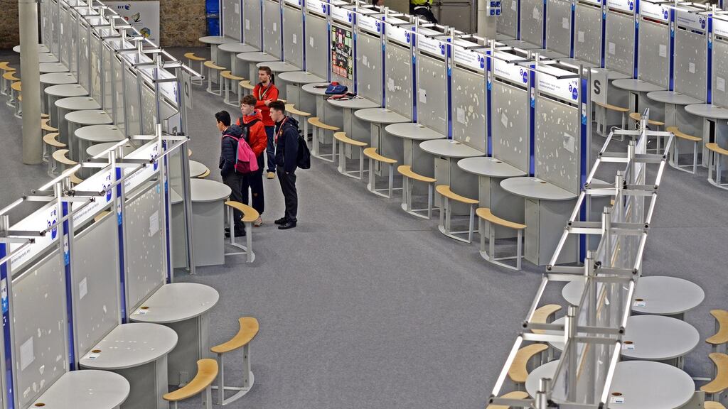 Students preparing their stand at the BT Young Scientist & Technology Exhibition at the RDS. Photograph: Eric Luke