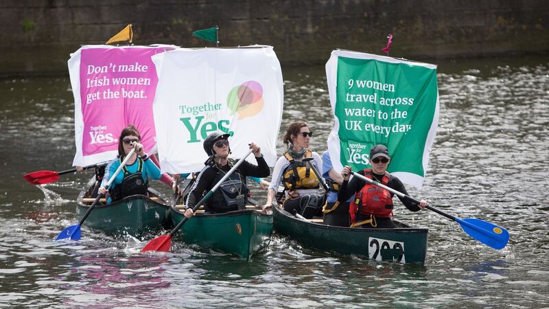 Together for Yes campaigners took to the River Liffey on Saturday - nine in all in three canoes - to symbolise, they say, the nine women sailing to the UK each day to access abortion. Photograph: Tom Honan