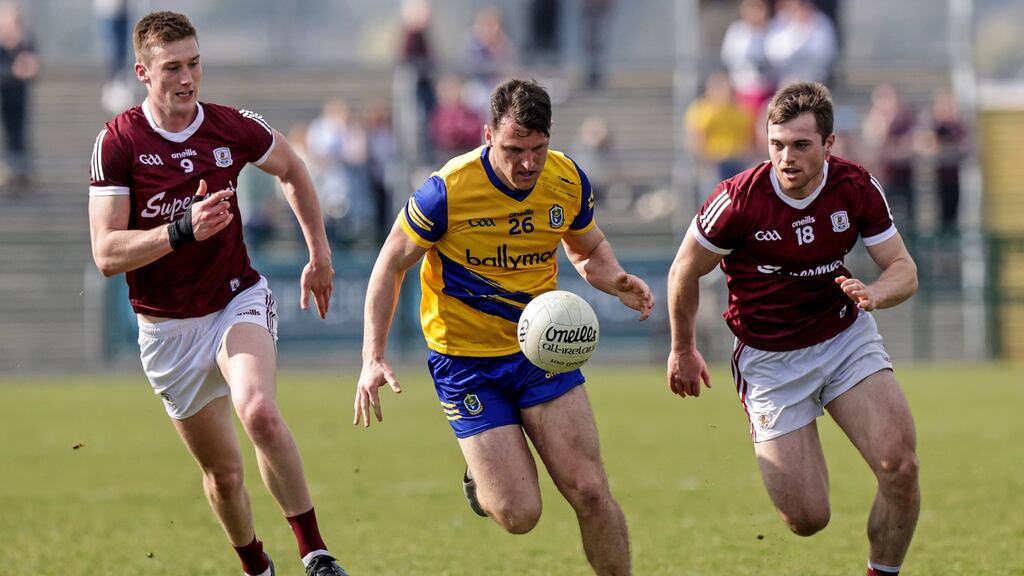 Roscommon’s Diarmuid Murtagh gets away from Galway’s Niall Daly and Liam Silke. Photograph: John McVitty/Inpho