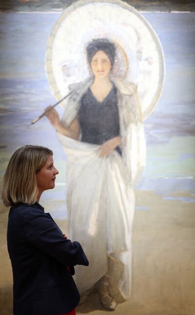 Dr Caroline Campbell, director of the National Gallery of Ireland, in front of John Lavery's painting L'Été (Summer). Photograph: Laura Hutton