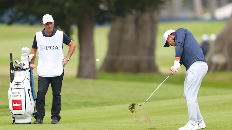 Koepka regularly plays practice rounds on his own just with his caddiue Rickie Elliott. Photo: Tom Pennington/Getty Images