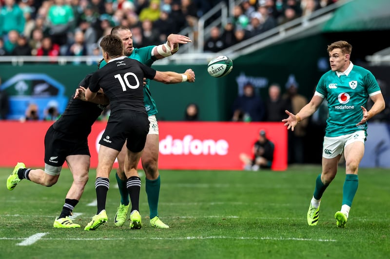 Ireland's Stuart McCloskey passes the ball to Garry Ringrose during last Saturday's match against New Zealand at Soldier Field, Chicago. Photograph: Gary Carr/Inpho