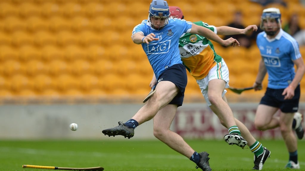 Sean Treacy of Dublin scores his side’s second goal with his foot despite the attempts of Cathal O’Brien of Offaly during the Bord Gáis Energy Leinster GAA Hurling U21 Championship Final match between Offaly and Dublin at O’Connor Park in Tullamore. Photo: Matt Browne/Sportsfile