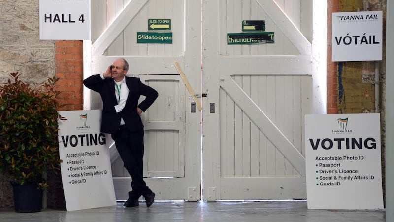 Delegate Michael Dullea from Clonakilty makes a call on the second day of the 74th ardfheis in the RDS. Photograph: Alan Betson
