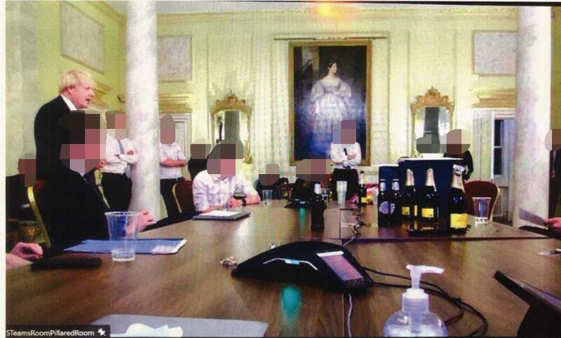 Then prime minister Boris Johnson (left) at a leaving gathering for two officials, involving 15-20 people, in 10 Downing Street, London, when rules were in force for the prevention of the spread of Covid. Photograph: Cabinet Office/PA Wire