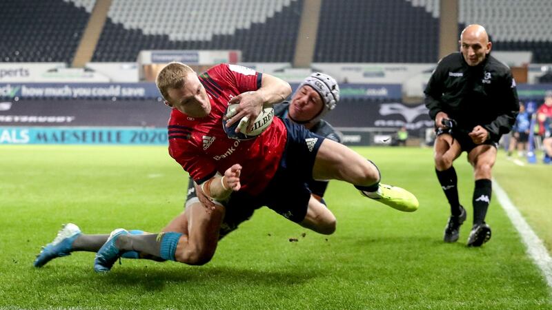 Munster’s Keith Earls scores a try in the corner in the Heineken Champions Cup match against the Ospreys at the Liberty Stadium in Swansea. Photograph: Dan Sheridan/Inpho