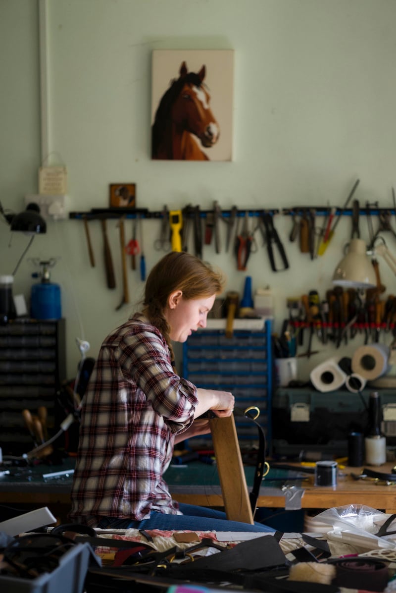 Saddle maker Lucy Cushley in her workroom in Co Down