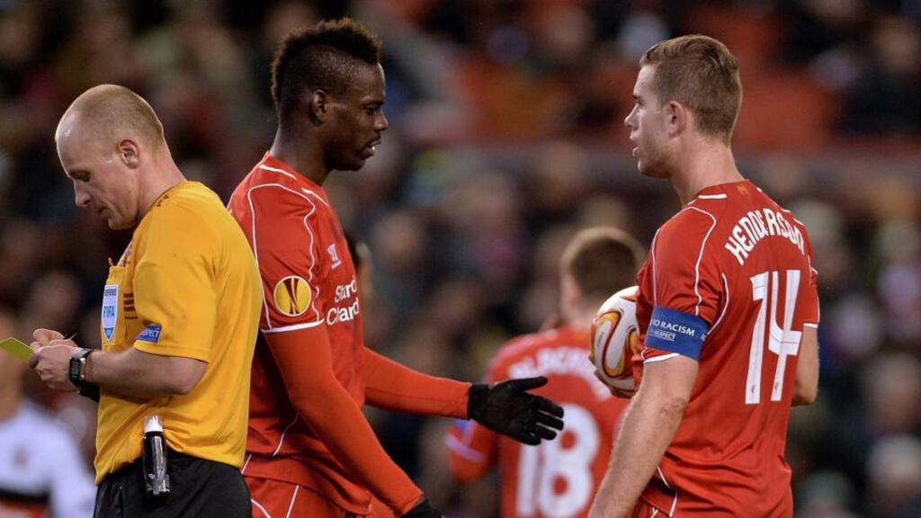Mario Balotelli takes the ball from Liverpool captain  Jordan Henderson  before taking and scoring the penalty  in the  1-0 first-leg victory over Besiktas in the Europa League at Anfield. Photograph:  Peter Powell/EPA