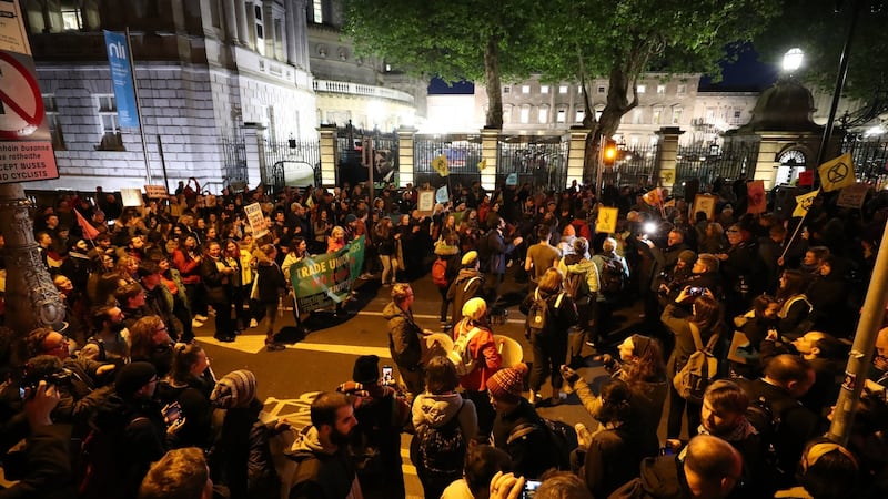 Demonstrators during an Extinction Rebellion protest on the day of Budget 2020, outside Leinster House in Dublin. Photograph: Niall Carson/PA Wire
