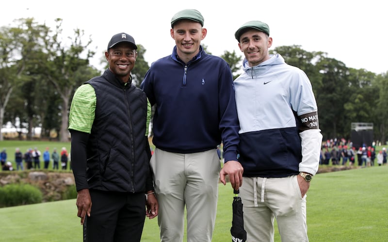 Tiger Woods meets Limerick hurlers Gearóid Hegarty and Barry Nash at Adare Manor. Photograph: Morgan Treacy/Inpho