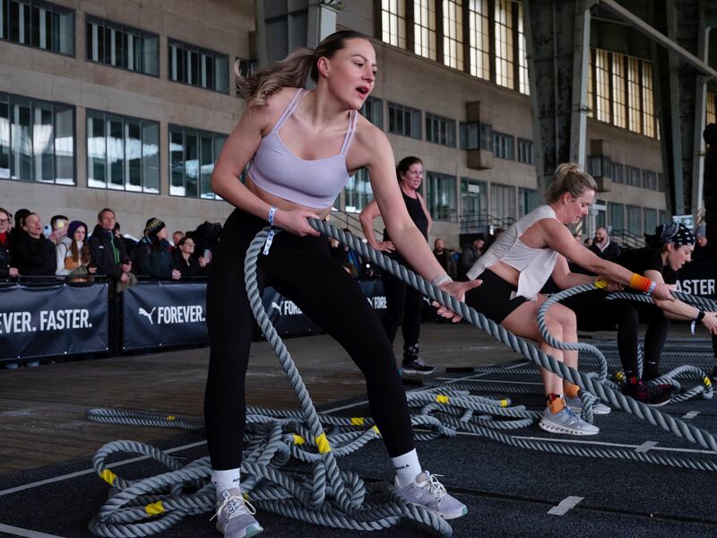 Competitors at the sled pull station during a Hyrox event. Photograph: Maria Sturm/The New York Times