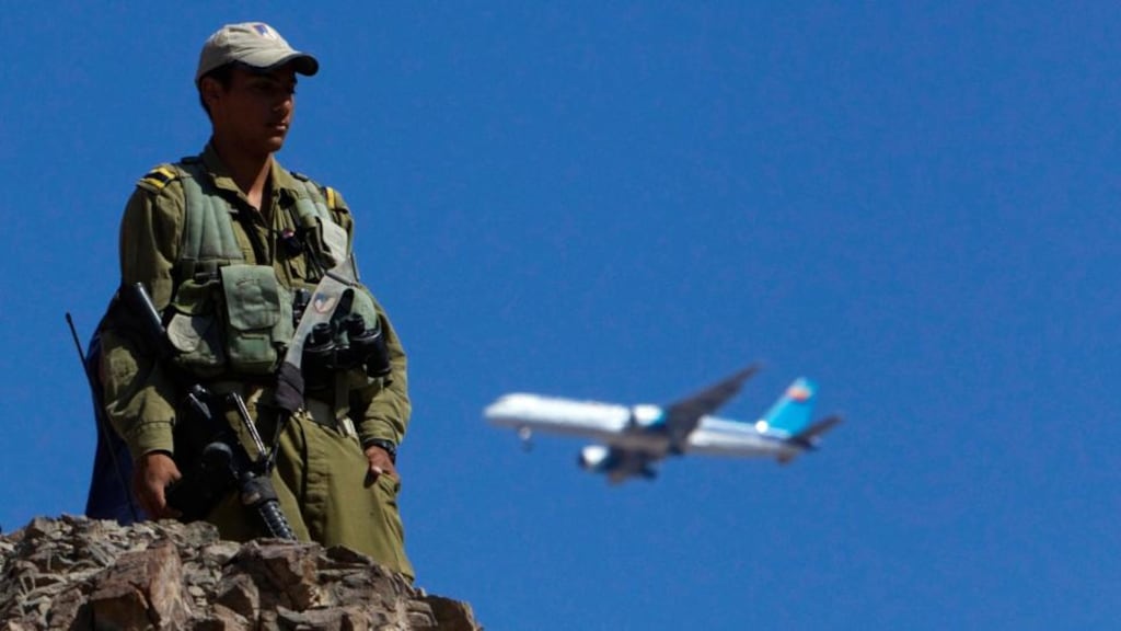 An Israeli soldier stands guard near the Israeli-Egyptian border, close to the Red Sea resort of Eilat. Last night’s attack coincides with an ongoing campaign by the Egyptian army against Islamic gunmen in the Sinai. Photograph: Reuters/Ronen Zvulun
