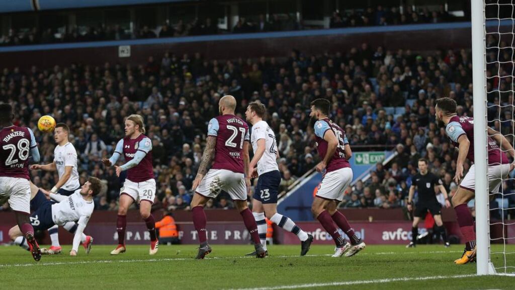 Preston North End’s Tom Barkhuizen scores during the Championship match against Aston Villa at Villa Park. Photograph: Nigel French/PA Wire