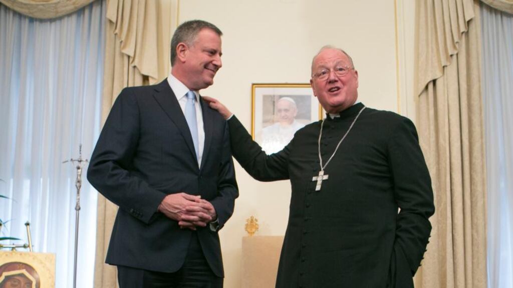 New York Mayor Bill de Blasio meets Cardinal Timothy Dolan at his residence in New York. Photograph: Fred R Conrad/The New York Times.