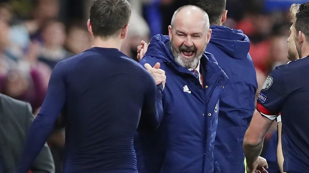 Scotland manager Steve Clarke celebrates the World Cup qualifier victory over Denmark with Calum McGregor at Hampden Park. Photograph: Ian MacNicol/Getty Images