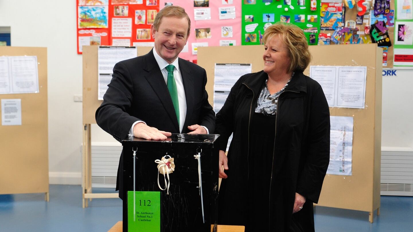Taoiseach Enda Kenny casts his vote with his wife Fionnuala in Castlebar, Co Mayo. Photograph: Bloomberg