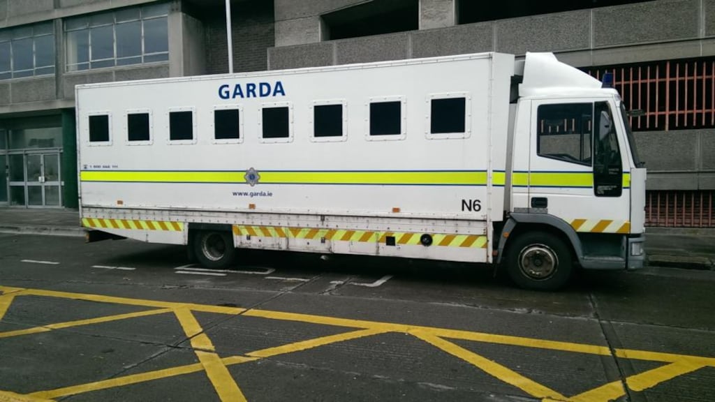 Among the resources drafted into Dublin city centre are Garda trucks that have been fitted with holding cells. Photograph: Conor Lally