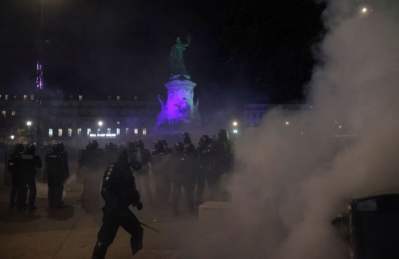 Police face protesters at Place de la Republique in Paris on Tuesday during a demonstration against pension reforms. Photograph: Ludovic Marin/AFP via Getty Images