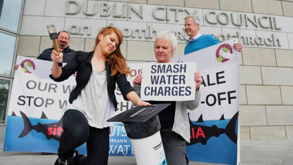 People before Profit Local Election canditates Kim O’Donnell, Brid Smith, Paul Shields and Andrew Keegan picutred protesting about water charges outside Dublin City Council Offices in Dublin today after they registered their names for the local elections. Photograph: Aidan Crawley/The Irish Times
