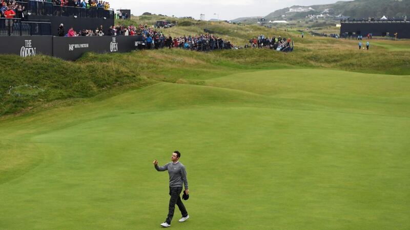 Rory McIlroy walks off after his second round of 65 at Portrush. Photograph: Paul Ellis/AFP/Getty