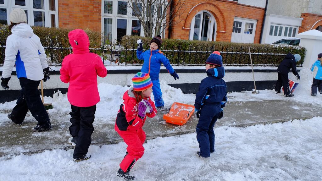 Snow fun: children playing in Sandymount, Dublin. Photograph: Frank Miller / The Irish Times