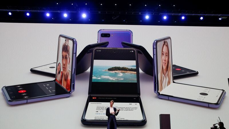 Rebecca Hirst of Samsung unveils the Z Flip foldable smartphone in San Francisco on Tuesday. Photograph: Stephen Lam/Reuters