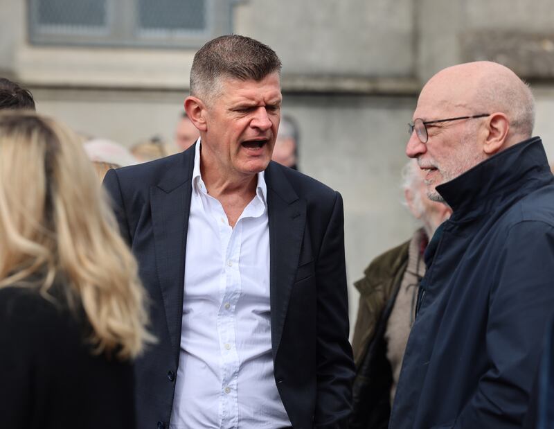 Brendan O'Connor and David Blake Knox at the celebration of Larry Masterson’s life in the Victorian Chapel, Mount Jerome, Harold’s Cross, Dublin. Photograph: Dara Mac Dónaill