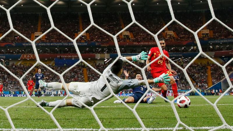 Nacer Chadli scores Belgium’s later winner against Japan. Photograph: Shawn Thew/EPA