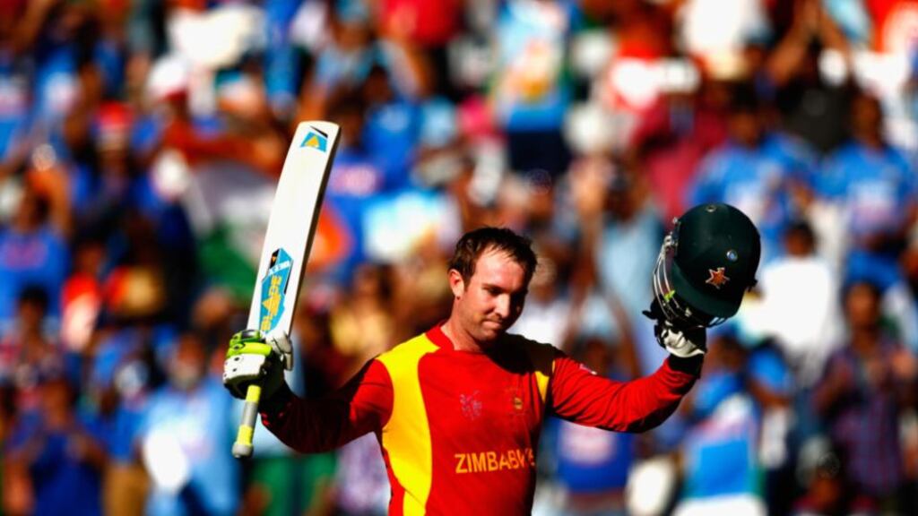 Brendan Taylor of Zimbabwe salutes the crowd as he leaves the field after making 138 in his final international match in the World Cup game against India at Eden Park in Auckland. Photograph: Phil Walter/Getty Images