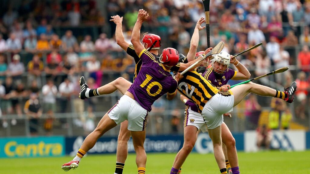 Kilkenny’s Enda Morrissey and Cillian Buckley in action against Lee Chin and Rory O’Connor of Wexford during the Leinster SHC round-robin match at Nowlan Park. Photograph: James Crombie/Inpho