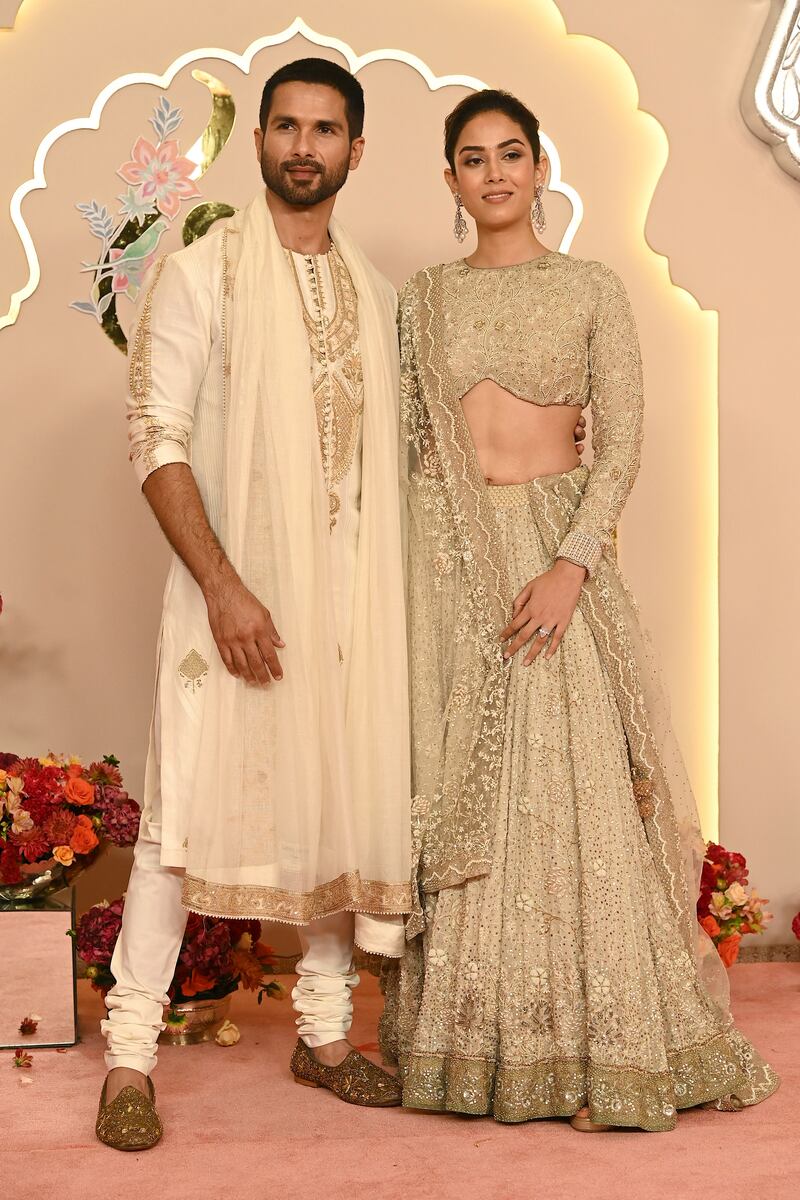 Ambani wedding: Bollywood actor Shahid Kapoor with his wife Mira Rajput. Photograph: Sujit Jaiswal/AFP via Getty Images