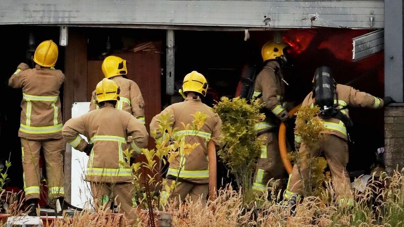 Fire crews battle the factory fire at Belfast Crystal. Photograph: PA