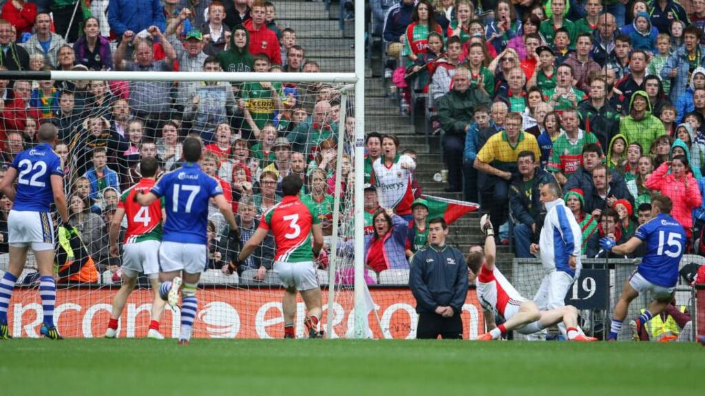 Kerry’s James O’Donoghue (15) finds the net to give his side a late reprieve against Mayo.